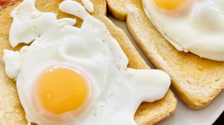 Two fried eggs on toast.