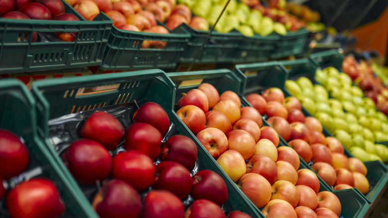 stacks of fruit in supermarket