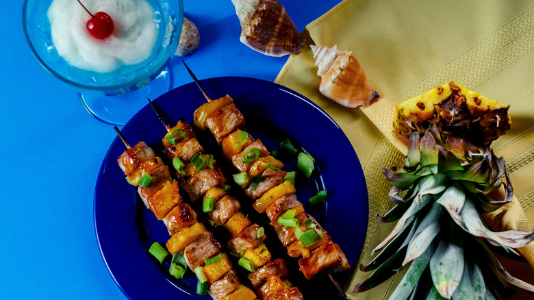 Grilled pork pineapple kebobs with icy cocktail