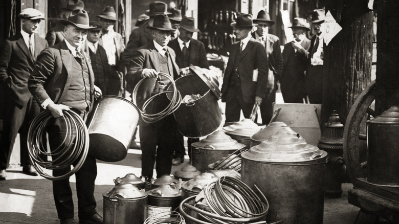 United States Federal agents confiscating illegal liquor stills in the 1920s.