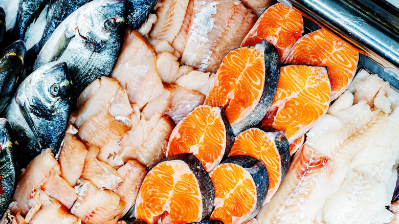 Various raw fish for sale at fish monger