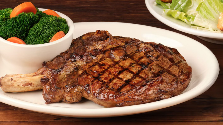 Bone-in steak and vegetables