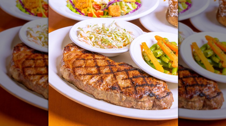 Steak with coleslaw and vegetables