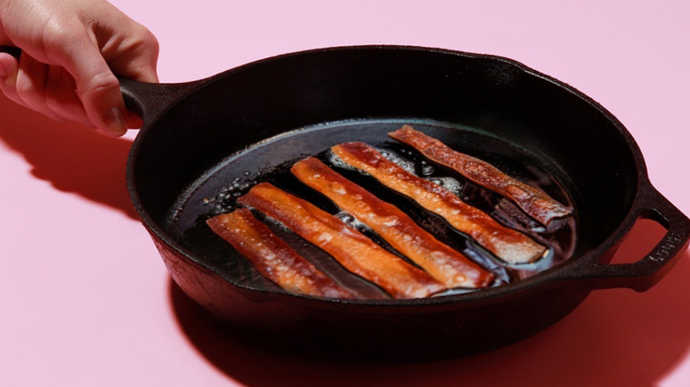 Plant-based bacon in skillet