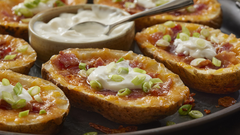 potato skins with bacon, cheese, and sour cream