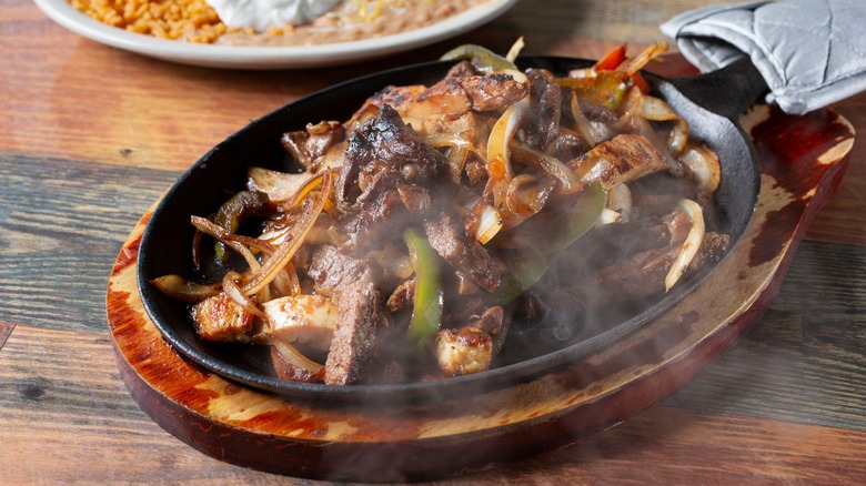 steak fajitas in a skillet