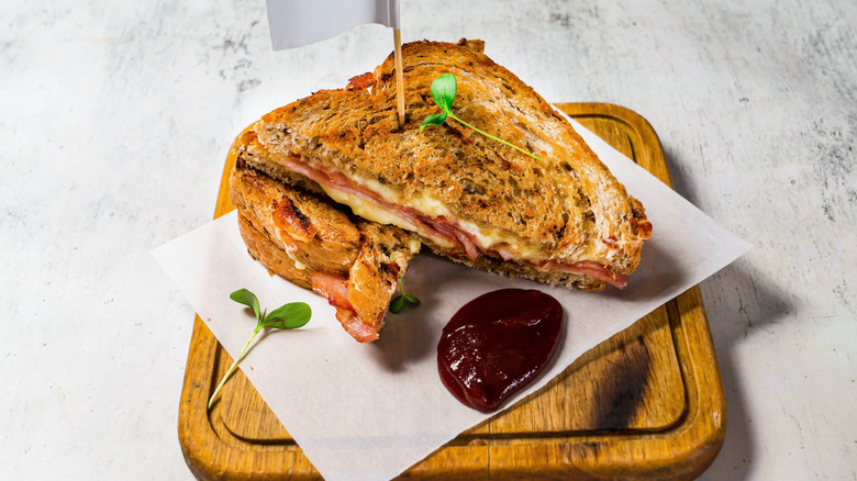 A ham and cheese toastie with ketchup