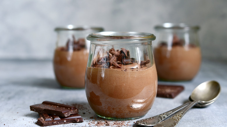 jars of chocolate mousse with chocolate shavings