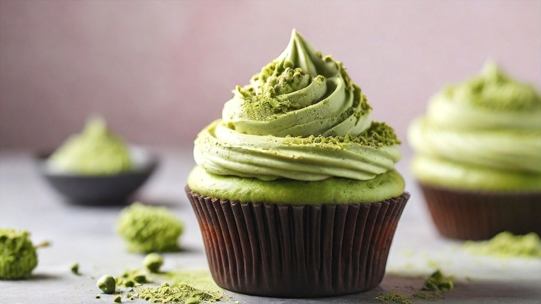 Matcha cupcakes with green frosting and brown cupcake liners