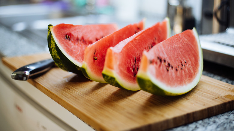 Watermelon halves on kitchen counter