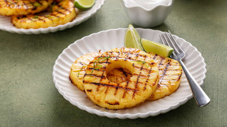 rings of grilled pineapple on plate