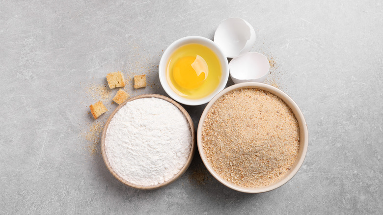 Flour eggs and breadcrumbs for frying