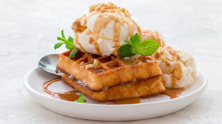 Waffles with ice cream and syrup