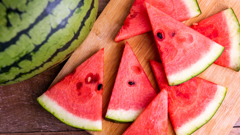 sliced watermelon on a cutting board