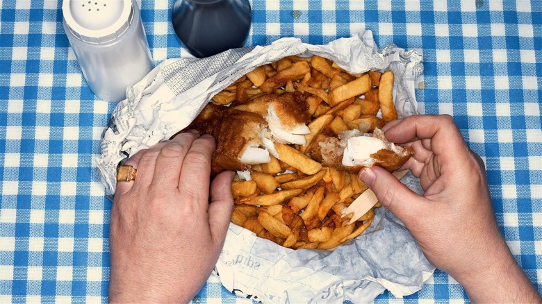 fish and chips on tablecloth