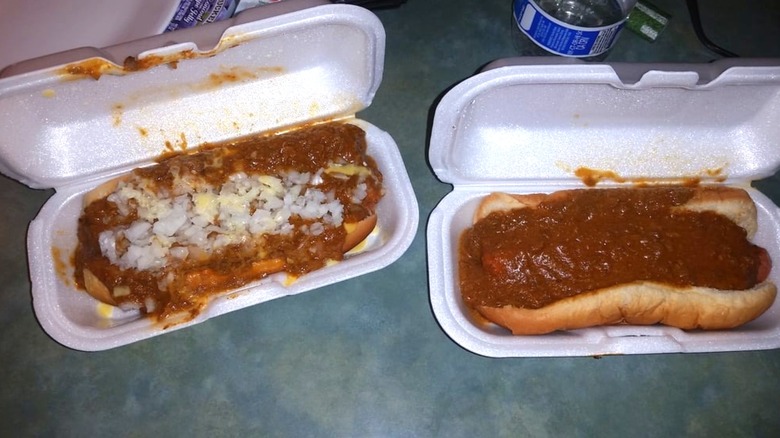 Two messy Coney dogs in foam containers at Senate Coney Island