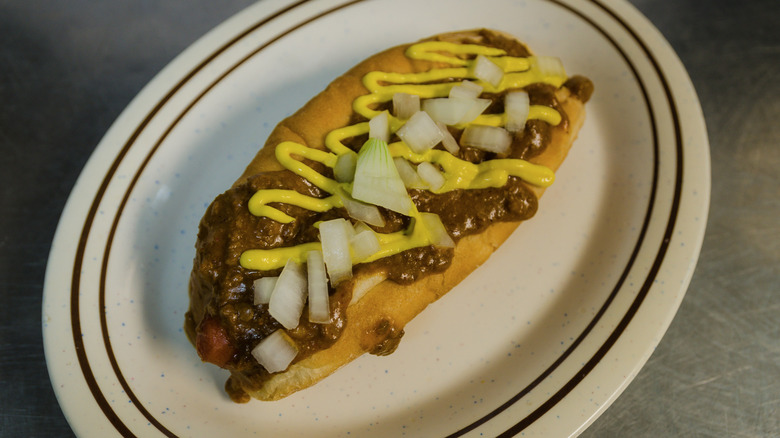 Zorba's Coney Island hot dog with chili and onions on plate