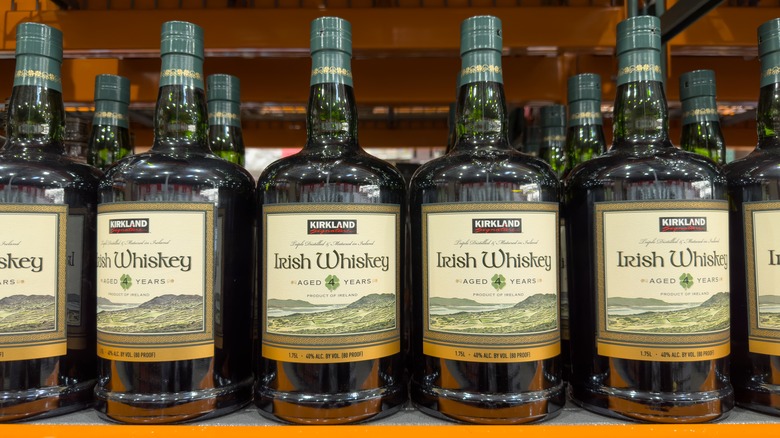 A row of Kirkland brand Irish whiskey on a shelf