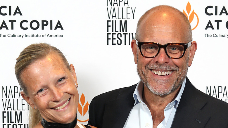 Elizabeth Ingram and Alton Brown on a film festival red carpet