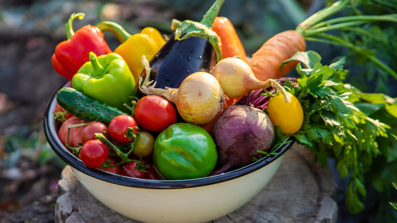 A bowl full of fruits and vegetables