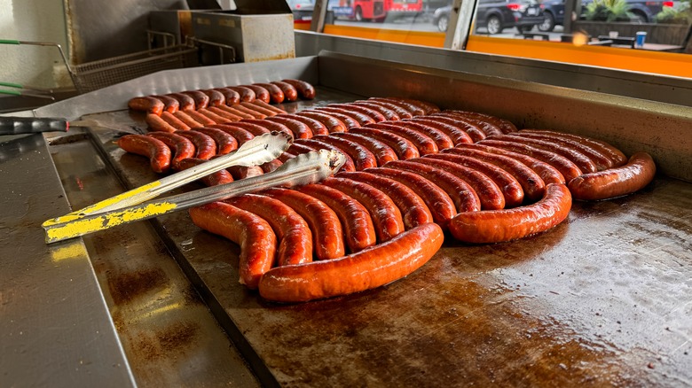 Hot dogs cooking at Ben's Chili Bowl