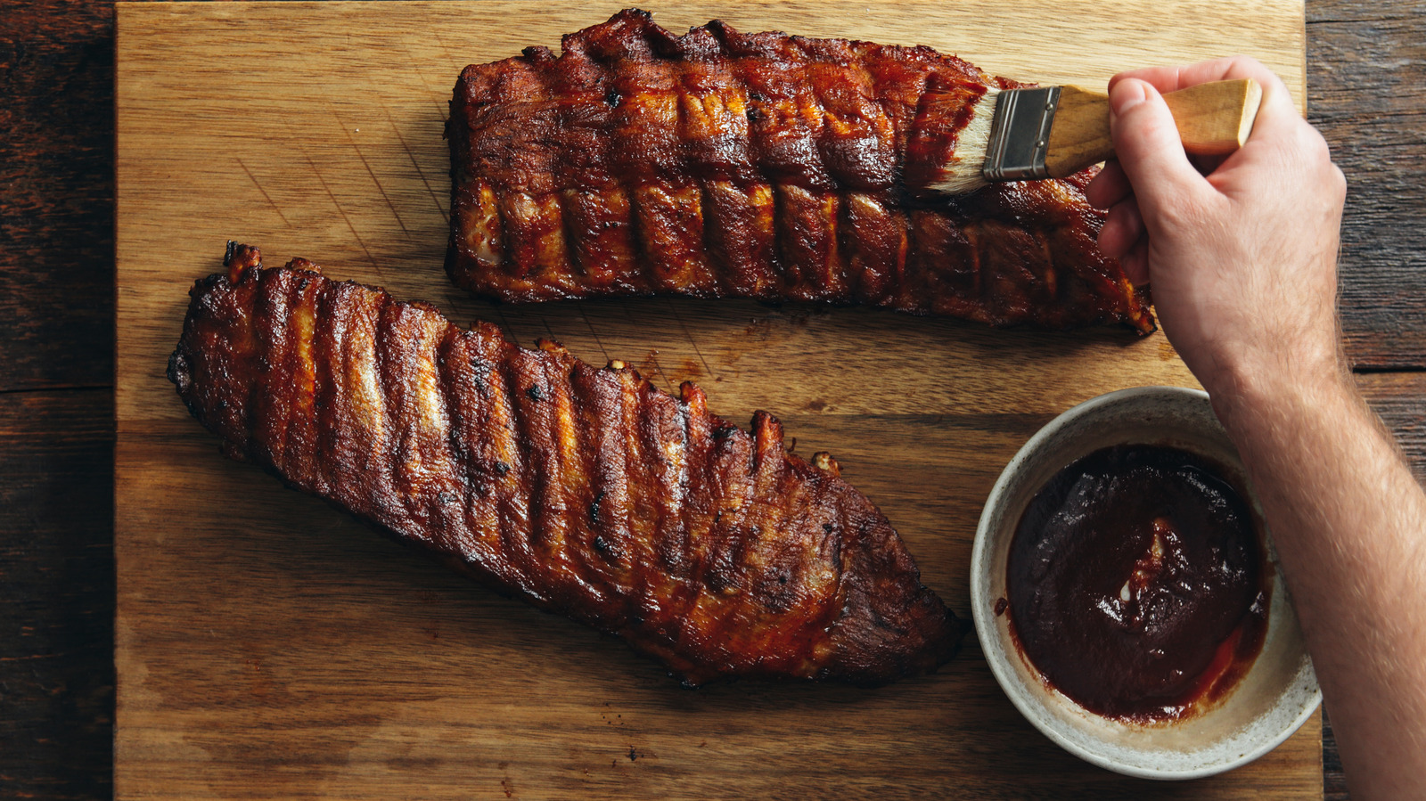 Boiling ribs before grilling them makes for tender meat