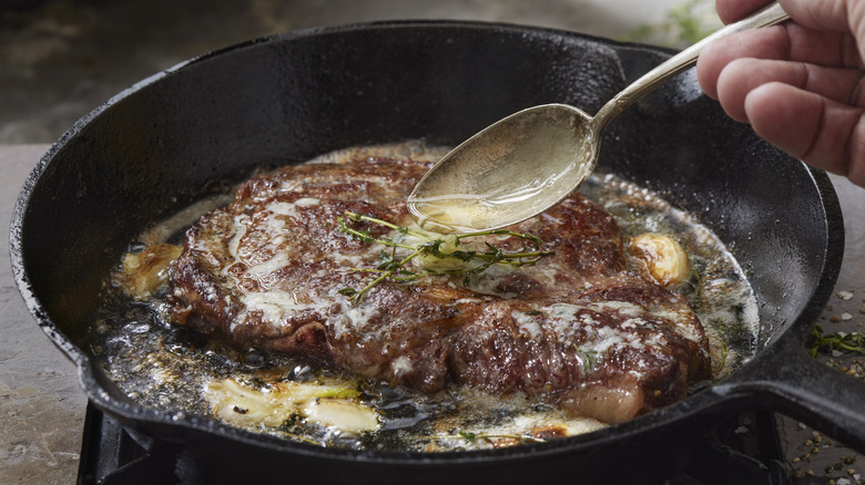 Searing steak in a pan