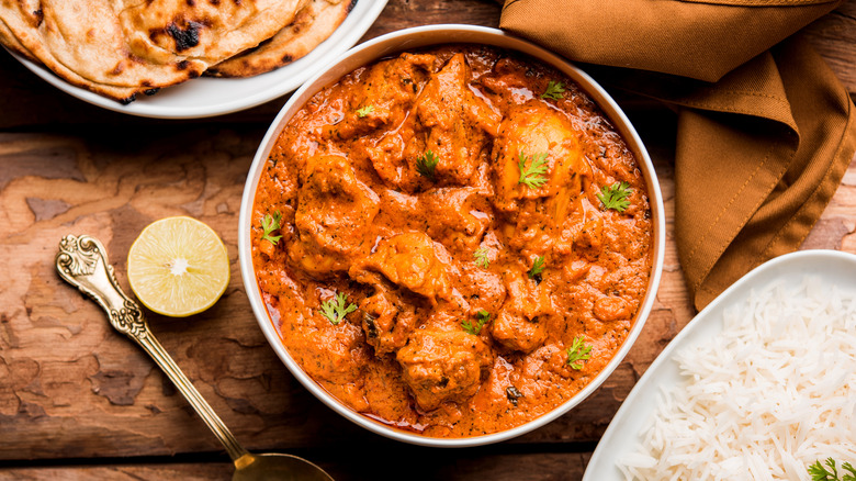 Butter chicken with rice and naan