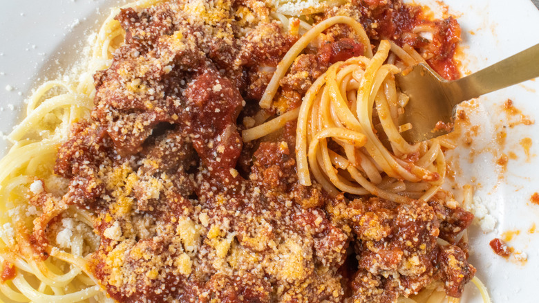 spaghetti with fork above with swirled pasta