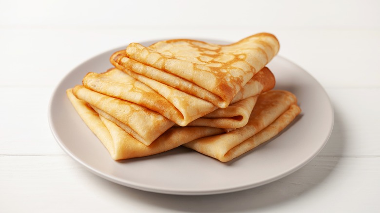 Folded crepes on a plate