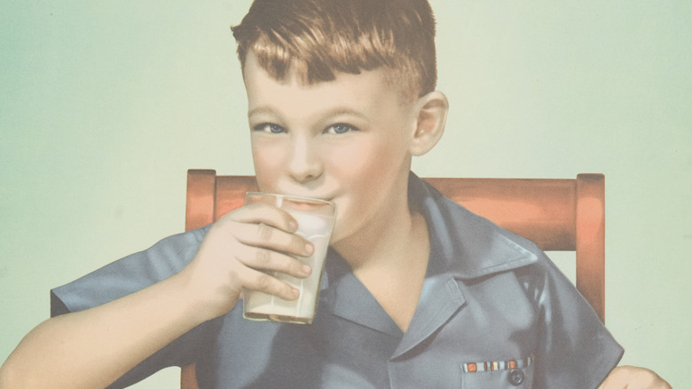 Historic ad of child drinking milk 