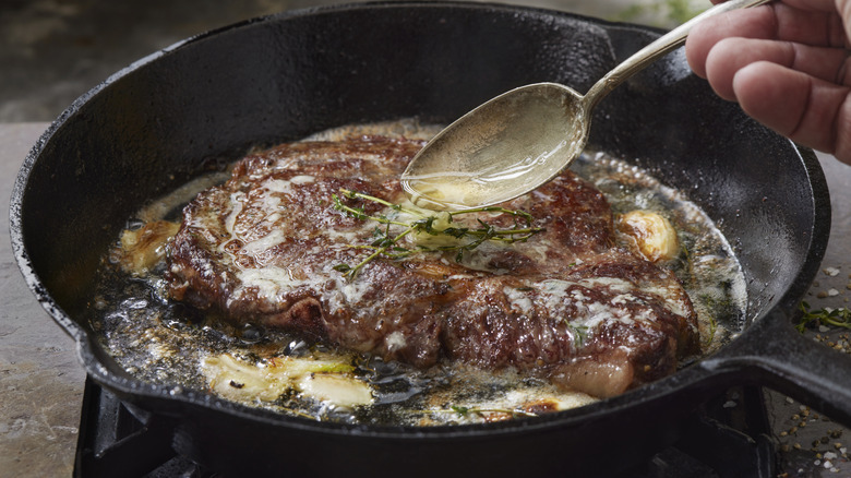 Pan searing steak with butter and herbs