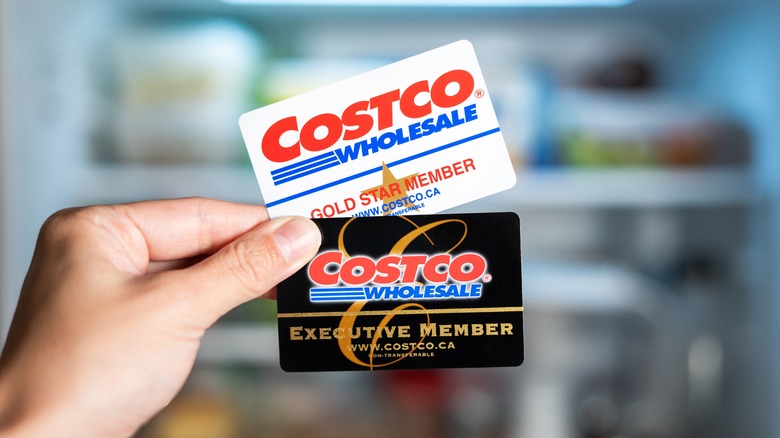 Two Costco membership cards