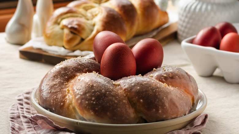 Easter eggs dyed red in Easter bread