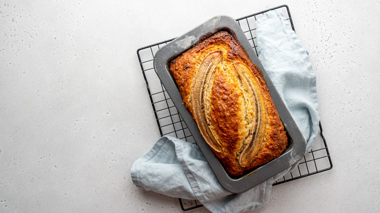 Fresh bread loaf on cooling rack