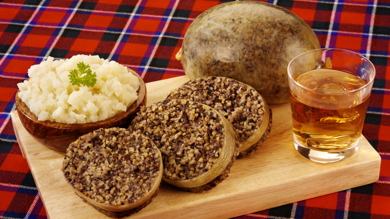 slices of Scottish haggis with whisky and neeps