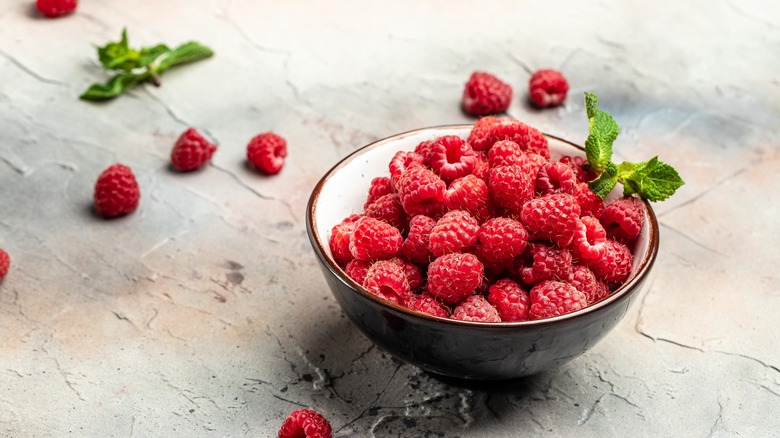 Bowl of raspberries and mint
