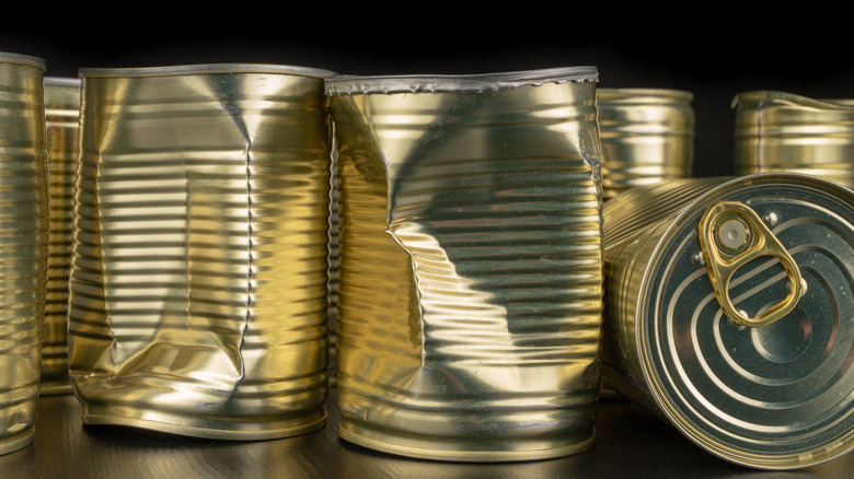 Dented cans of food