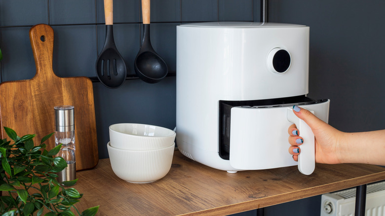 An air fryer on a table