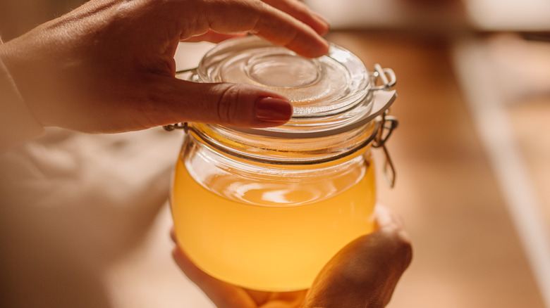 Clarified butter or ghee in a glass jar