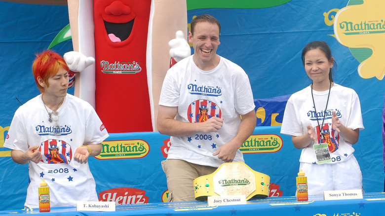 Joey Chestnut competing in Nathan's contest