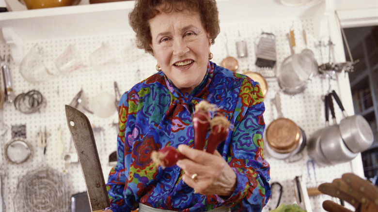 Julia Child holding a large carbon steel knife