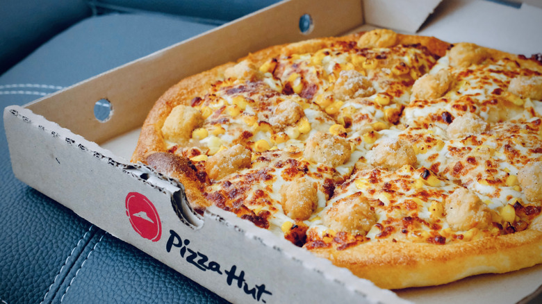 Popcorn Chicken Pizza from Pizza Hut and KFC.