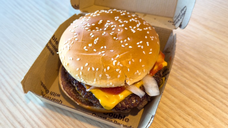 A Quarter Pounder with Cheese from McDonald's in a box