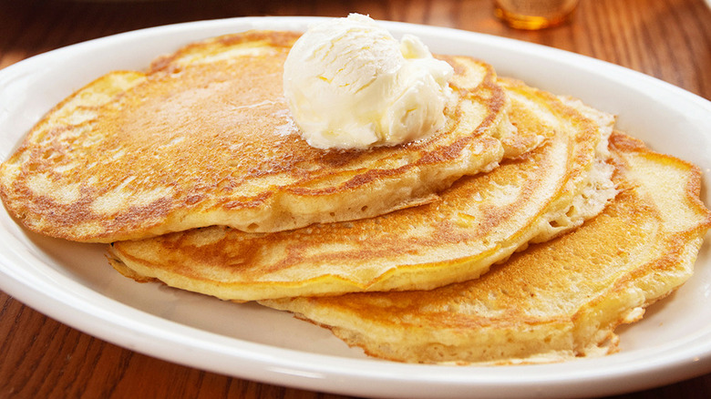 Plate of Cracker Barrel fluffy pancakes with butter