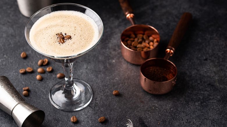 Espresso martini in glass with coffee beans