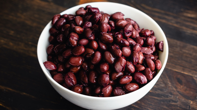 White bowl filled with rinsed and drained black beans