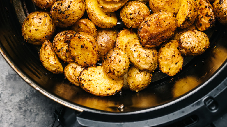 crispy potatoes in air fryer basket