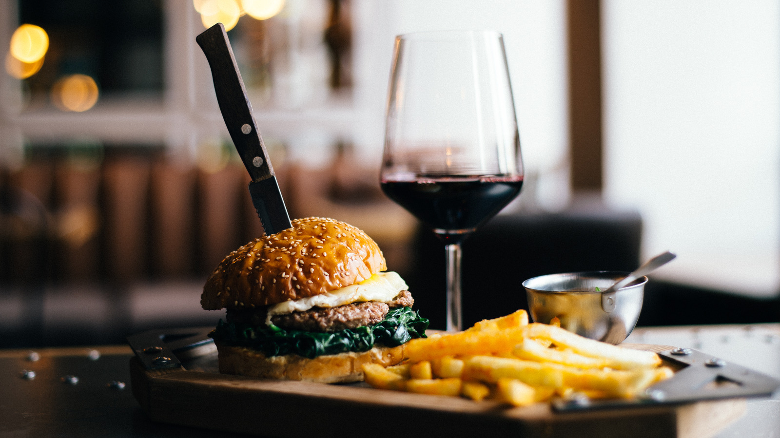 Why You Should Be Drinking Red Wine With Burgers, According To An Expert