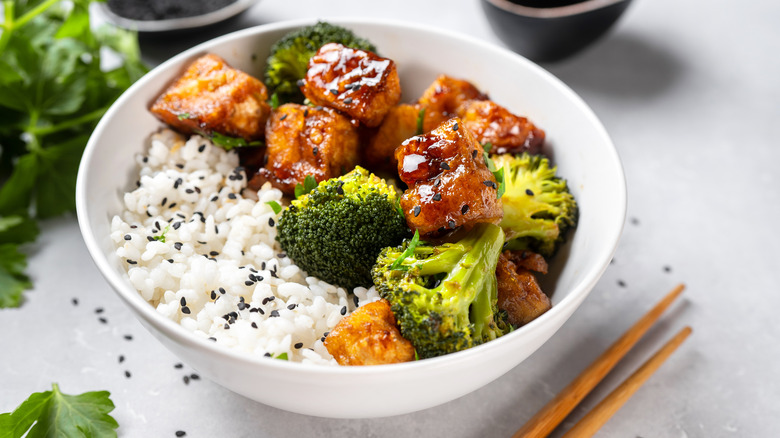 Stir fried tofu and broccoli over rice